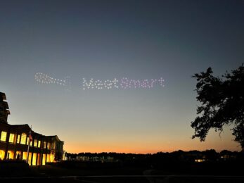 drones in sky that spell out "meet smart"