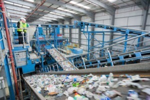 earth day article plastic at a waste sorting facility