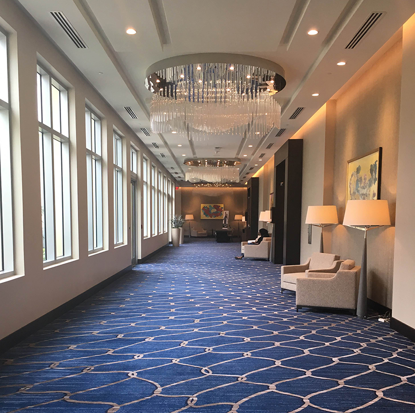 The walkway leads directly to the hall in front of Hilton's meeting spaces. 