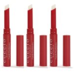 Three red tubes of portable cuticle balm