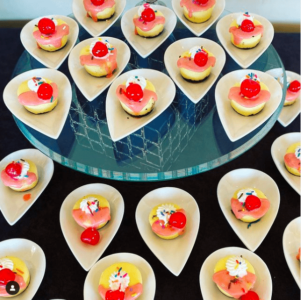 An arrangement of red and white desserts from Boulders Resort & Spa