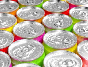 The tops of colorful aluminum cans