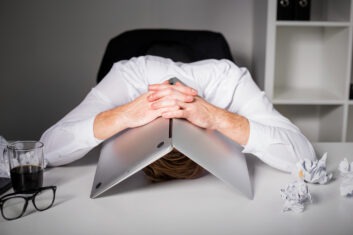 man frustrated with laptop