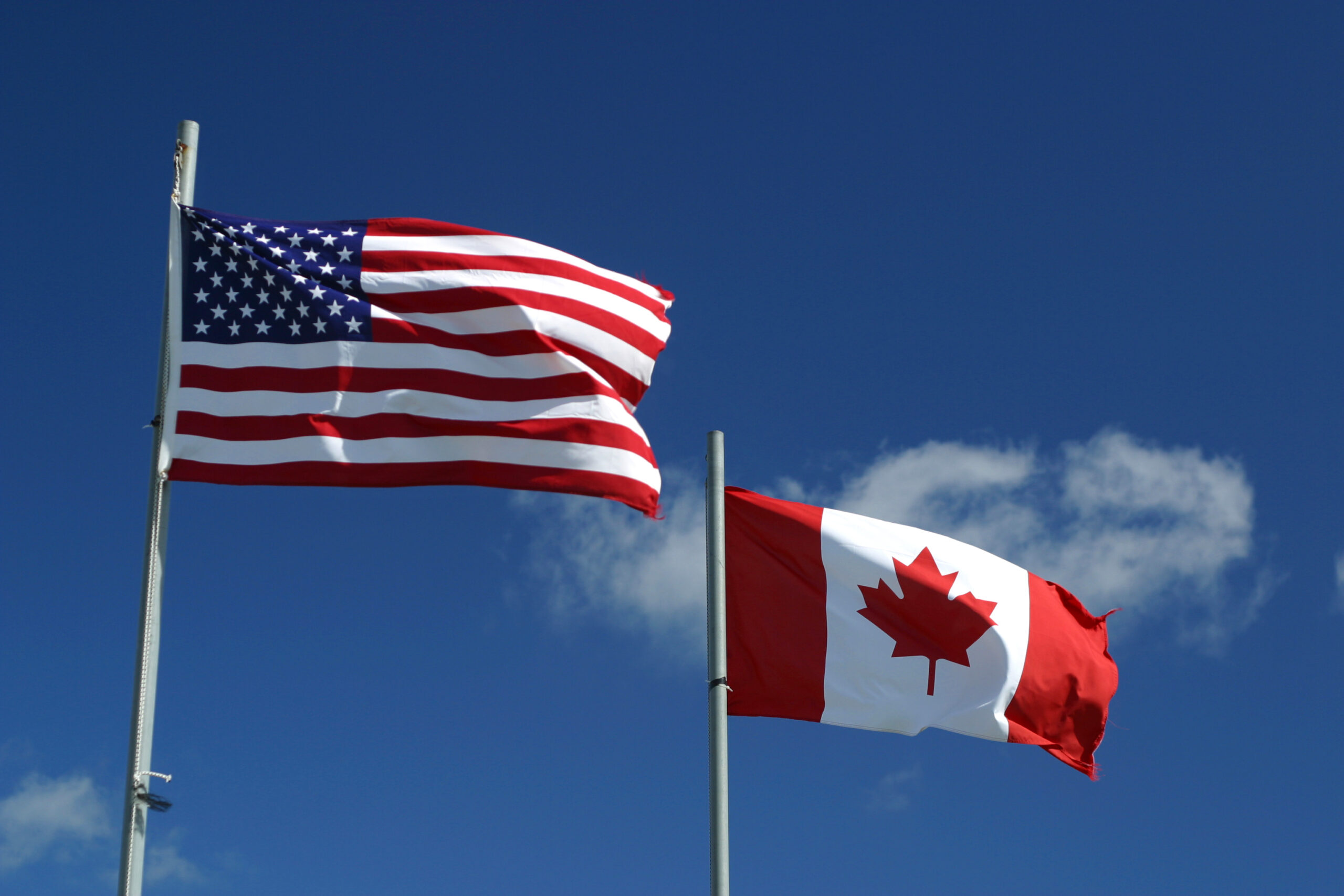 An American flag and Canadian flag 