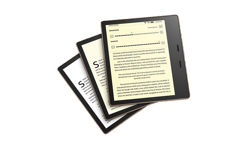 Three Amazon kindles displaying text from a book