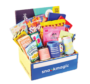 An assortment of snacks and candy in a blue box labeled "Snack magic"