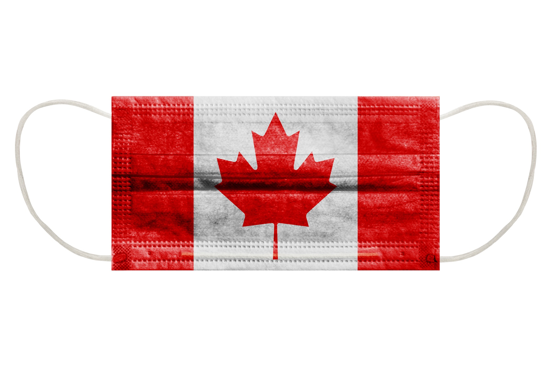 A surgical mask with the Canadian flag printed on it.