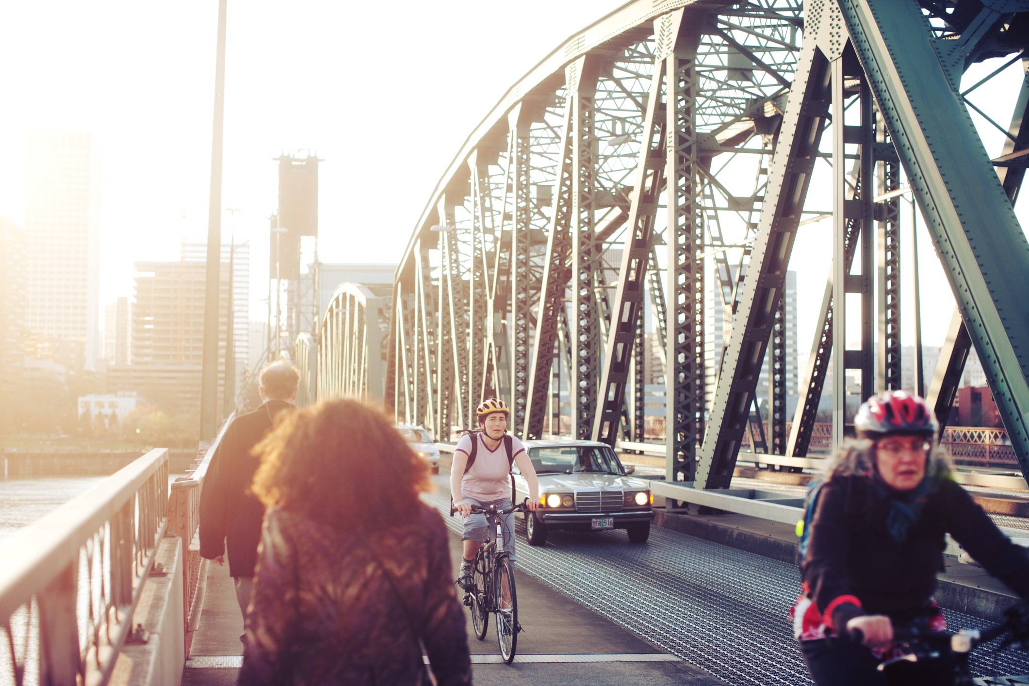 Cyclists ride on the Hawthorne Bridge in Portland.