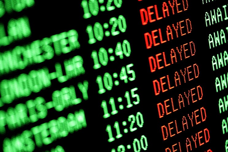 A stock image showing multiple flights being delayed on a schedule.