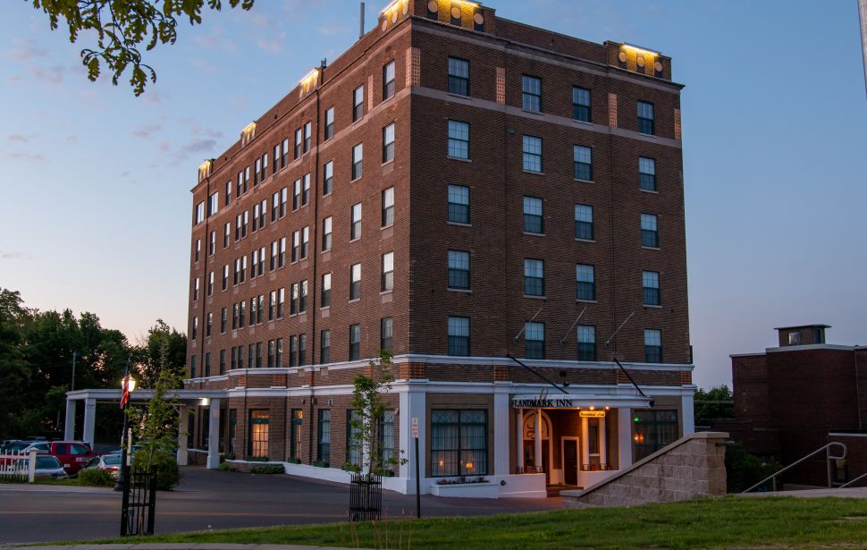 The Landmark Inn, a six-story brick hotel.