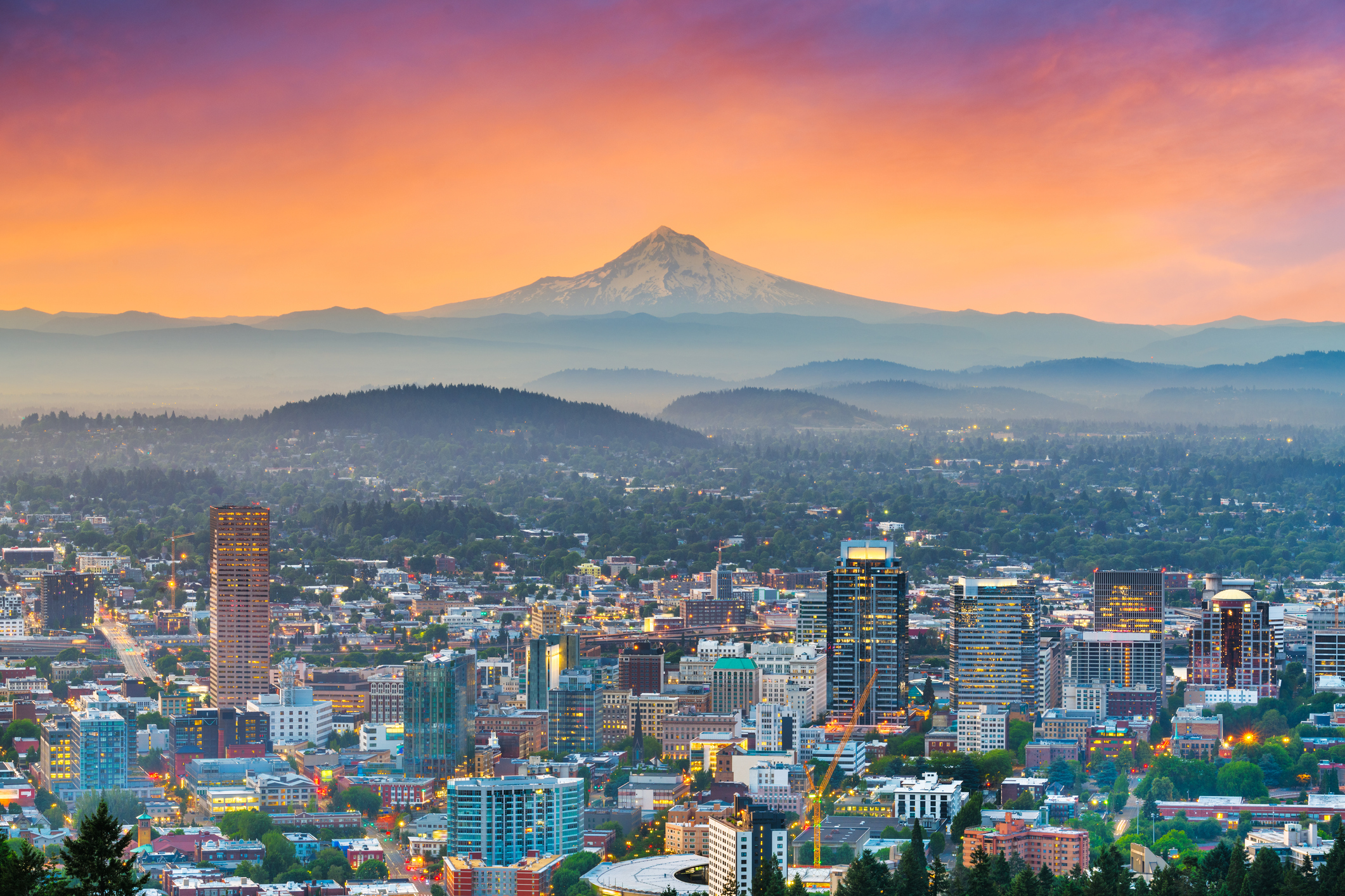 Portland, Oregon, USA downtown skyline with Mt. Hood at dawn.