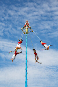Voladores, or pole flyers, performing the traditional Flying Birdmen ritual