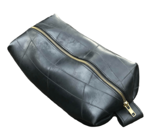 A black makeup bag made of recycled materials