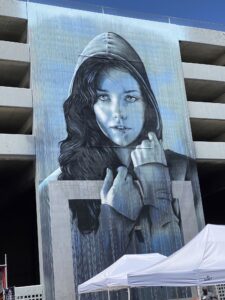 Image of a mural "Face of Reno" by Christina Angelina. 