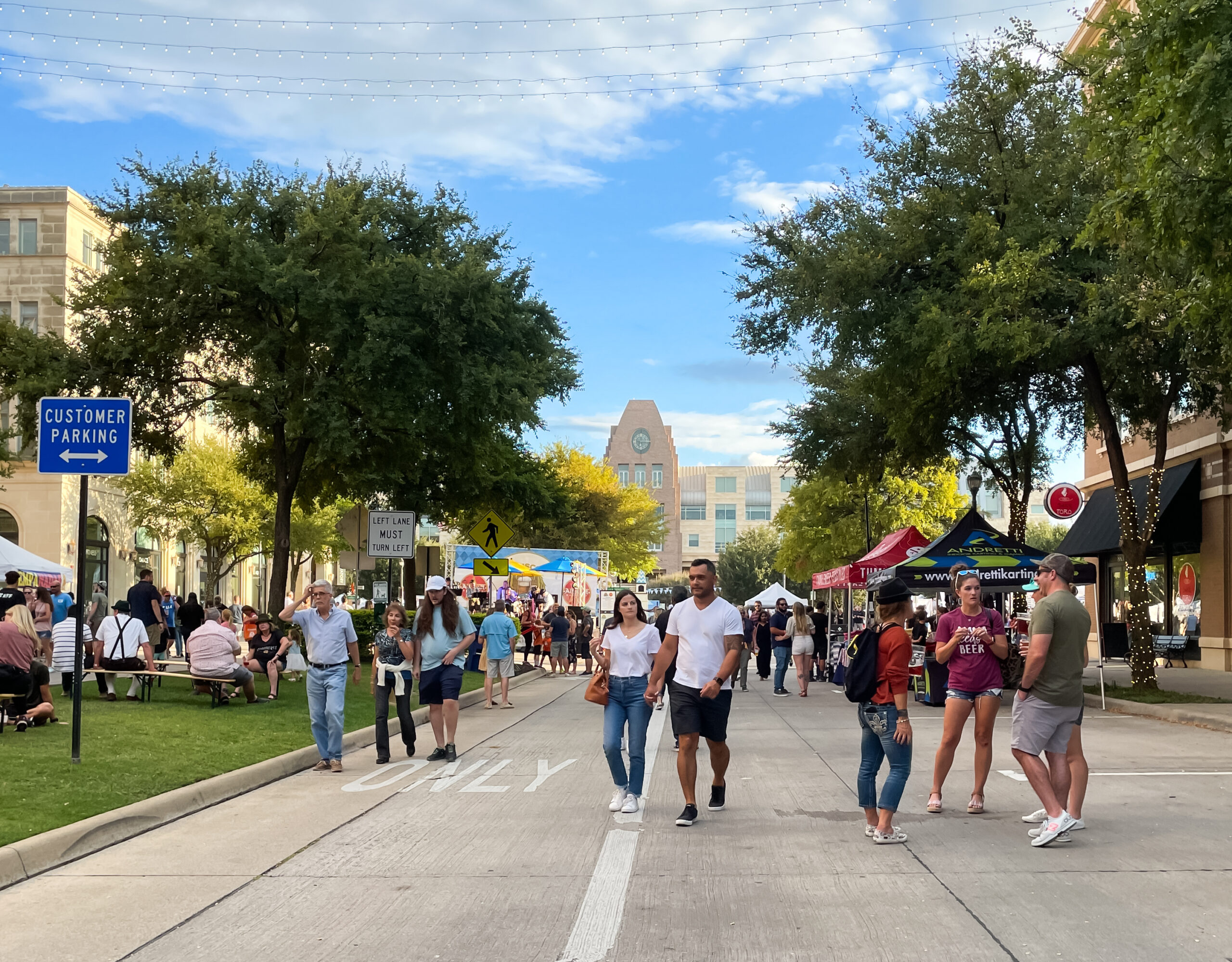 people walking around at frisco oktoberfest