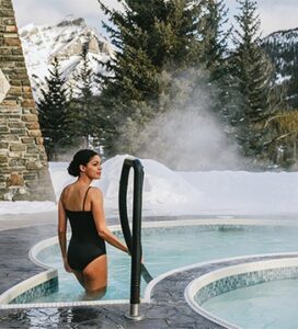woman in pool at Fairmont Banff Springs in canada