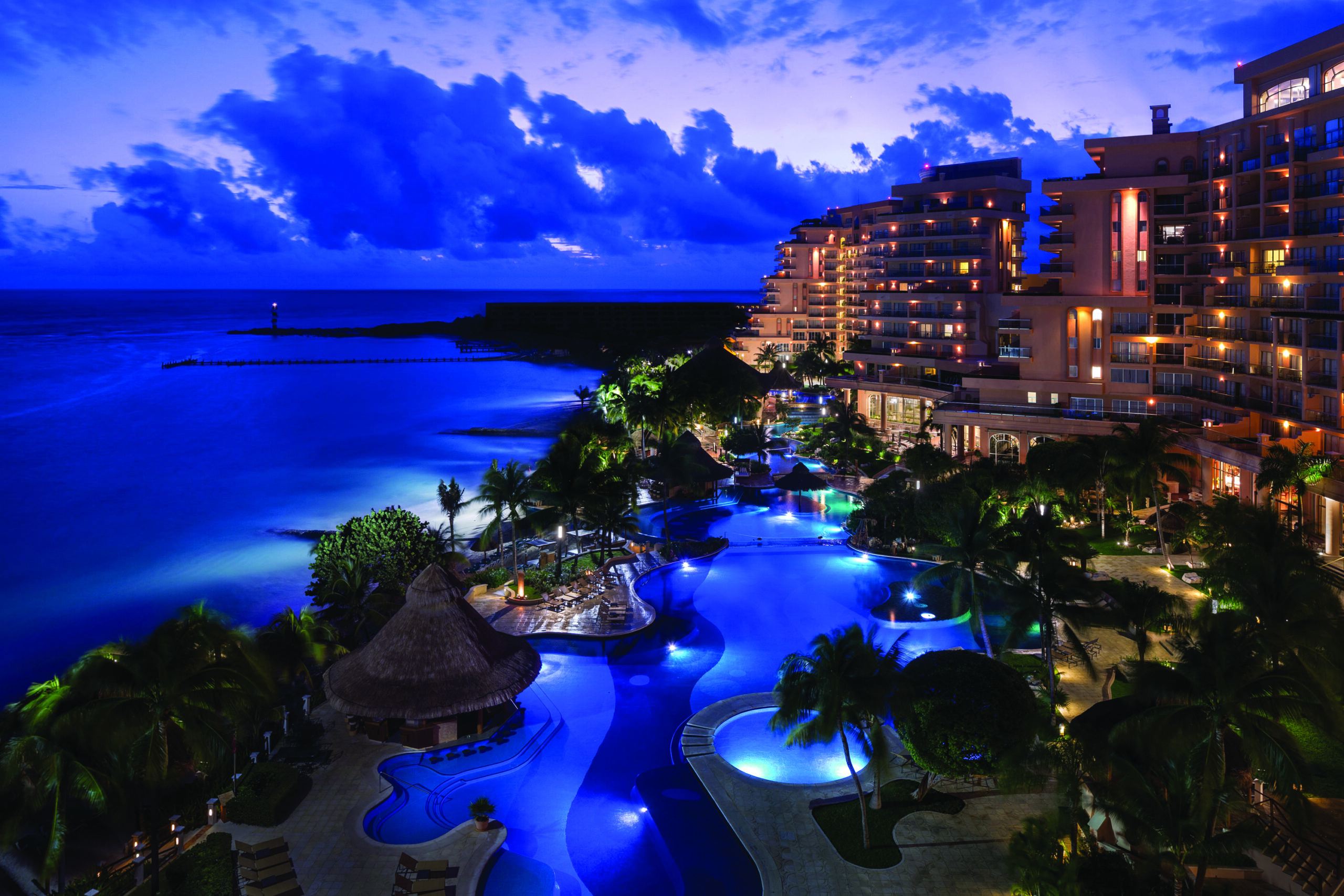 aerial view of Grand Fiesta Americana Coral Beach Cancun All Inclusive Spa Resort at night