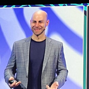 author adam grant on stage screen at pcma convening leaders