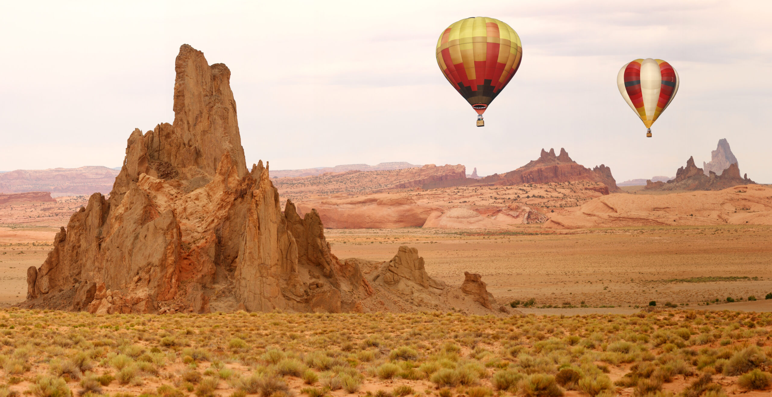 two Hot air balloonsover desert in New Mexico