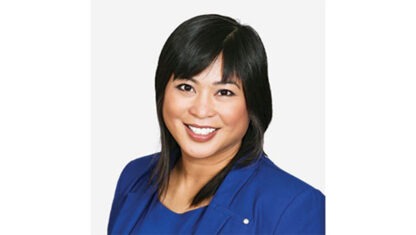 Rhanee Palma wearing blue shirt and blue blazer