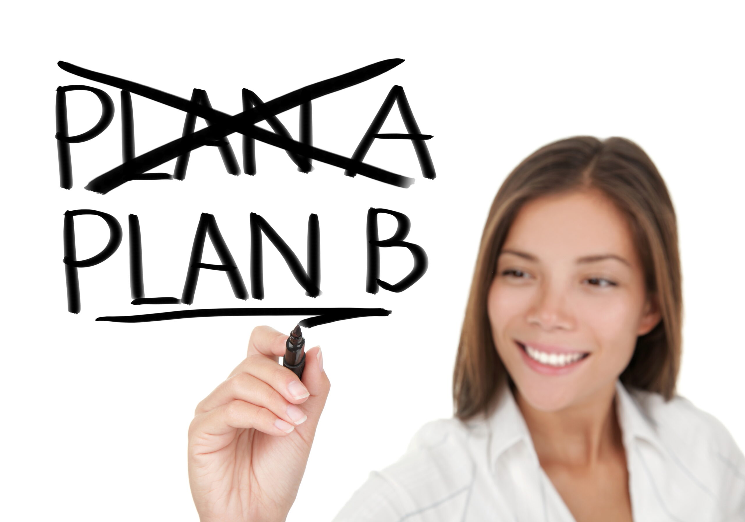 woman writing "plan b" and crossing out "plan a"