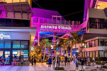 people hanging out at distrito t mobile in puerto rico