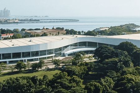 aerial view of panama convention center with ocean in background