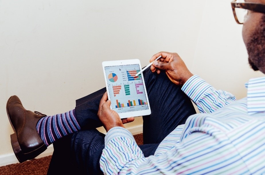 man working on iPad