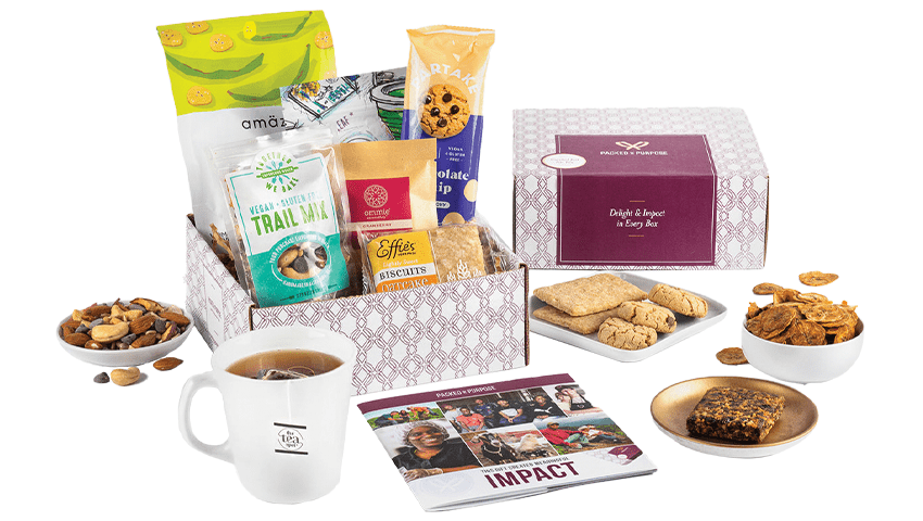 snack box that includes tea, various types of cookies and trail mix 