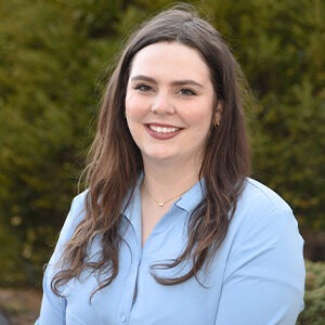 Rebekah Courtney wearing light blue dress shirt