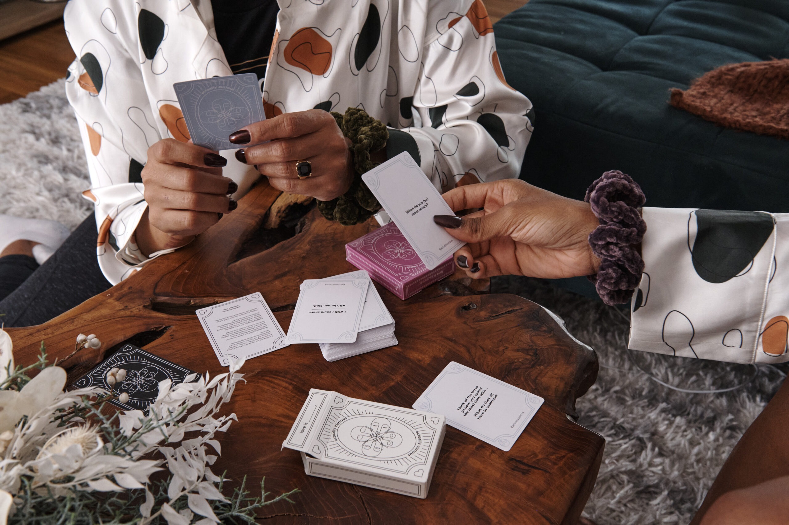 close up shot of two people playing card game