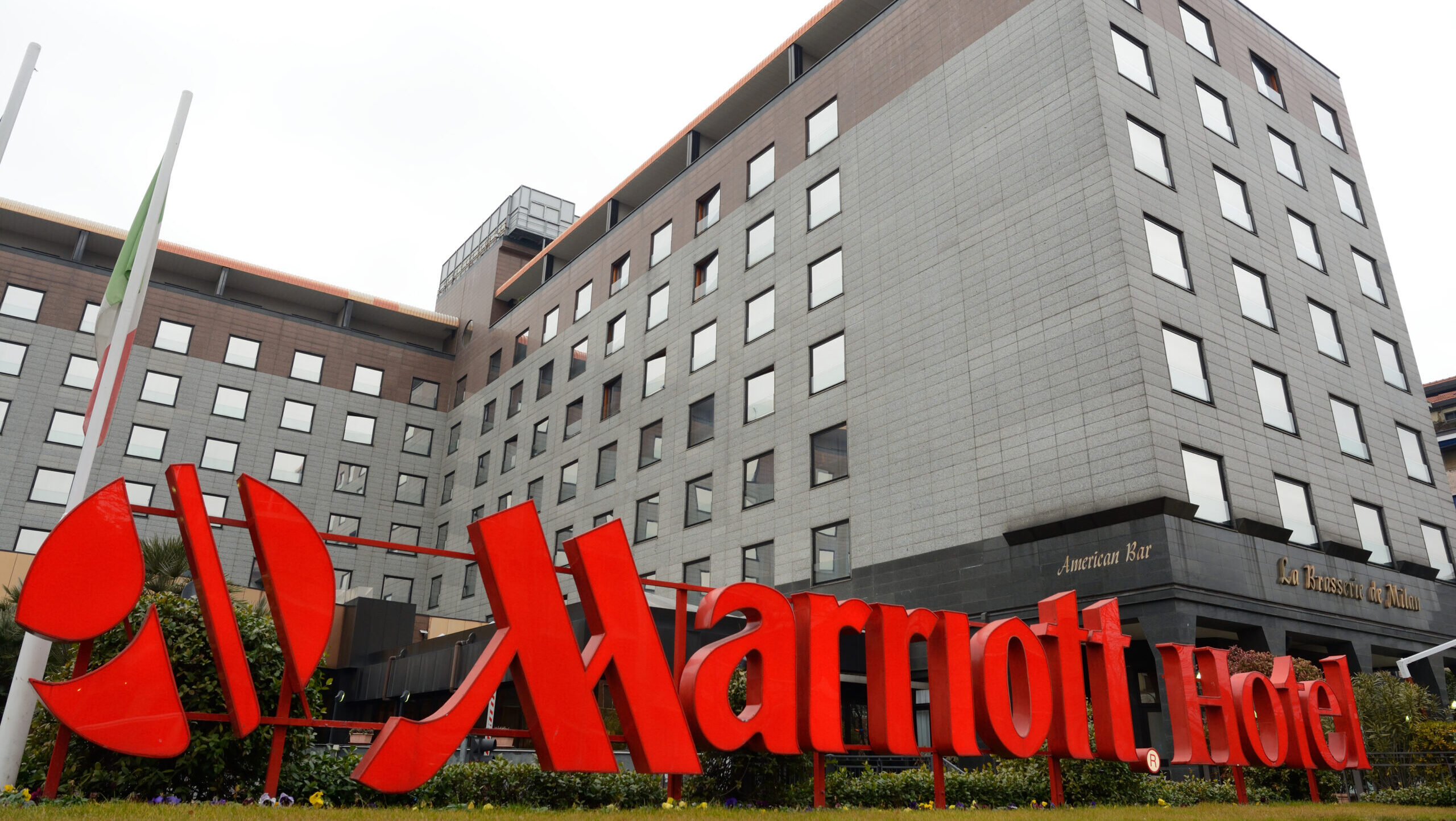 Gray building with red Marriott Hotel sign