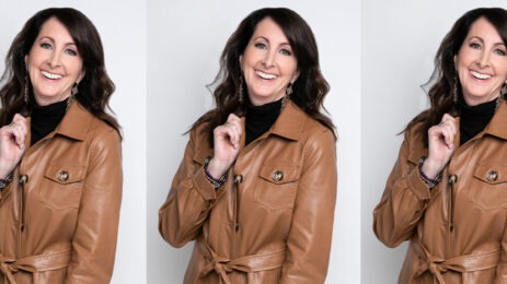 image of woman wearing brown leather jacket and black shirt