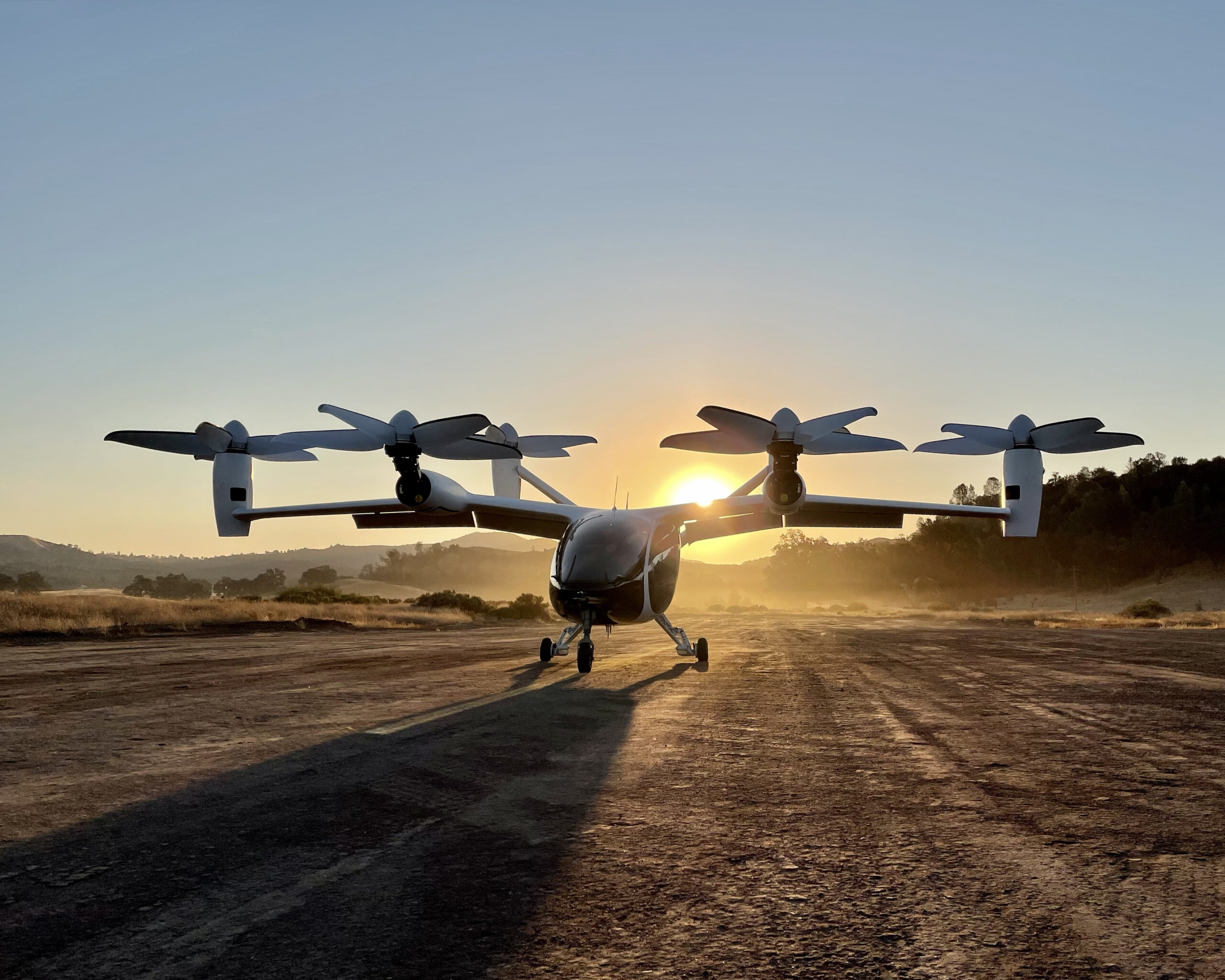 helicopter with four propellers on tarmac