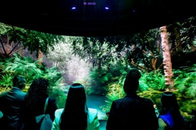 people standing in front of junglescape