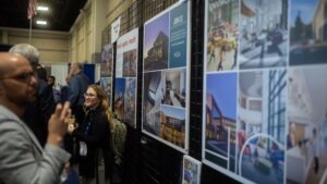 people talking on show floor