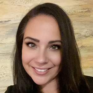 woman smiling, wearing black shirt