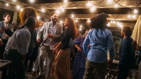 Friends Dancing Together and at a Party