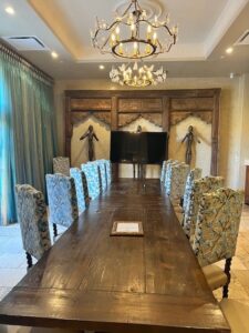 wood boardroom table and decorative chairs in Dylan meeting room at Allegretto Vineyard resort