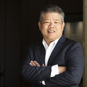 Headshot of Jon Ushijima, director of international sales at The Ritz-Carlton Residences, Waikiki Beach