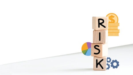 four wooden blocks that spell "risk"