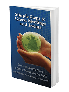 two hands holding a green earth on blue book cover
