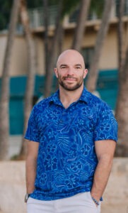 David Stevens wearing blue button up shirt