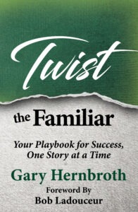 green and grey book that reads "twist the familiar"
