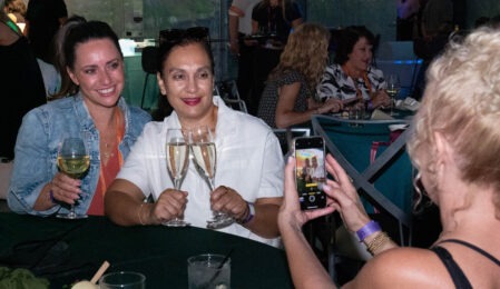 two women posing for picture