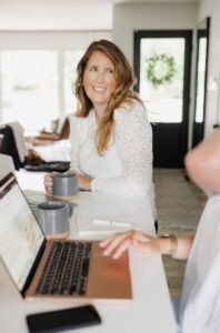 Heather O'Leary wearing white long sleeve shirt