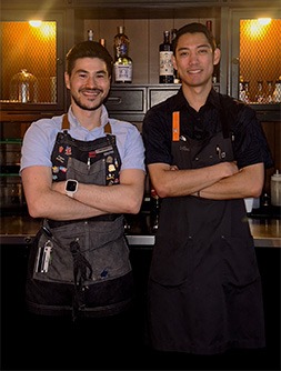 Benjamin Paparella, YNK bartender (left), and Sean Milan, F&B manager (right)