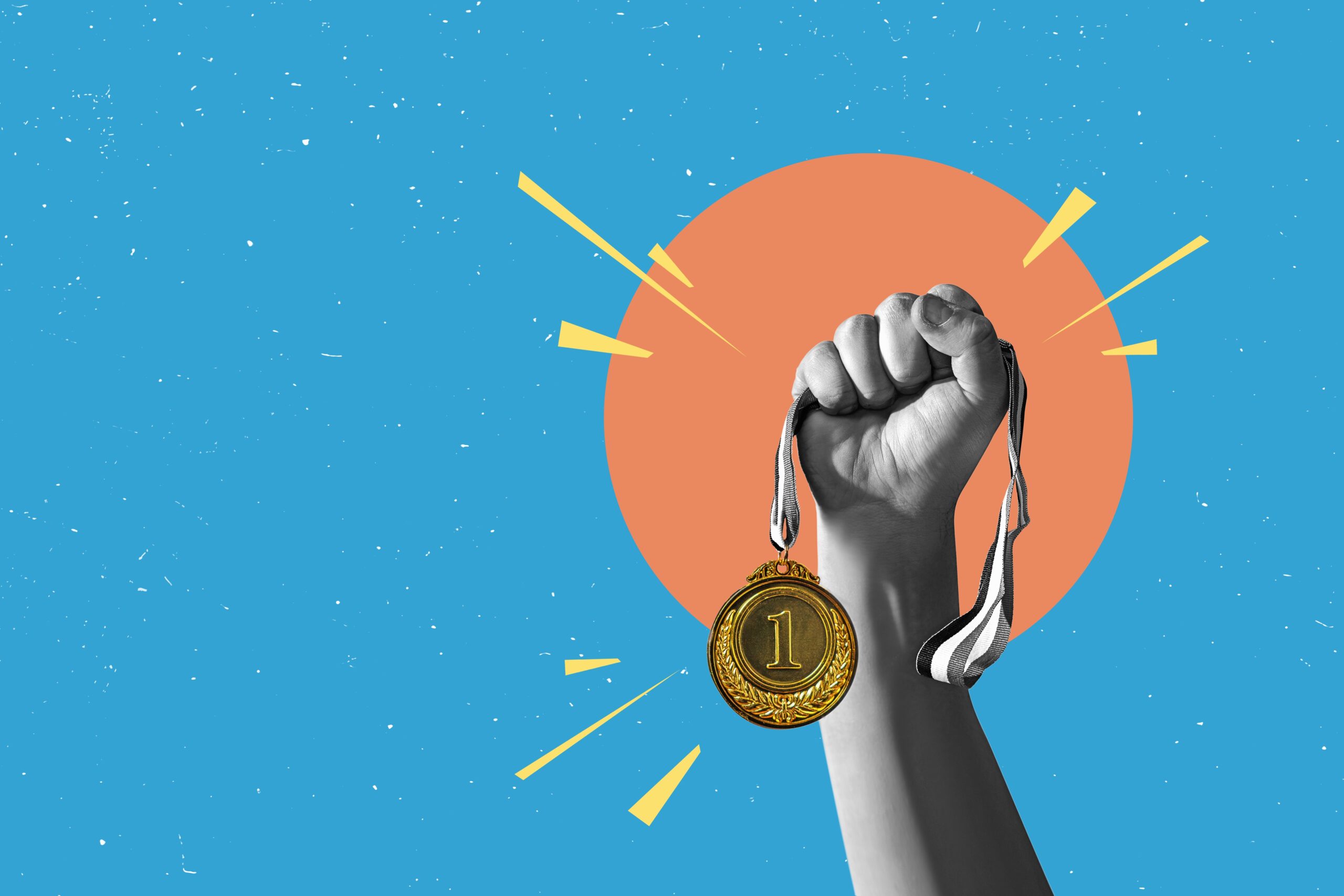 Hand holds and raised gold medal trophy, holding medal against blue background