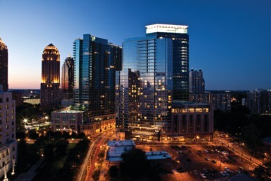 exterior of Loews Atlanta against skyline