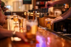 Close up shot of drinks on bar at Deschutes Brewery